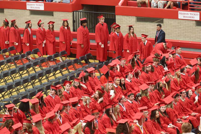 Ottawa High School class of 2026 graduates walk in procession during the commencement ceremony in Kingman Gymnasium on Friday, May 22, 2026 at Ottawa High School