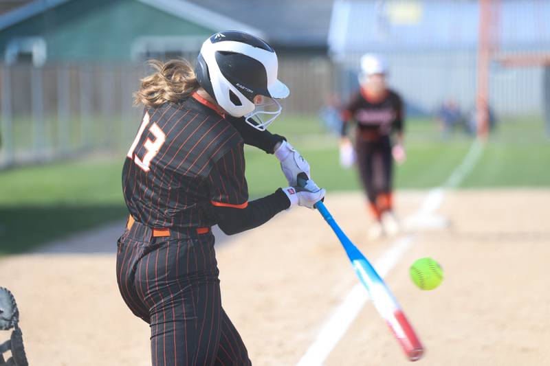 Minooka’s Aubrey Bird drives in a run against Joliet Catholic on Tuesday, April 7, 2026 in Minooka.