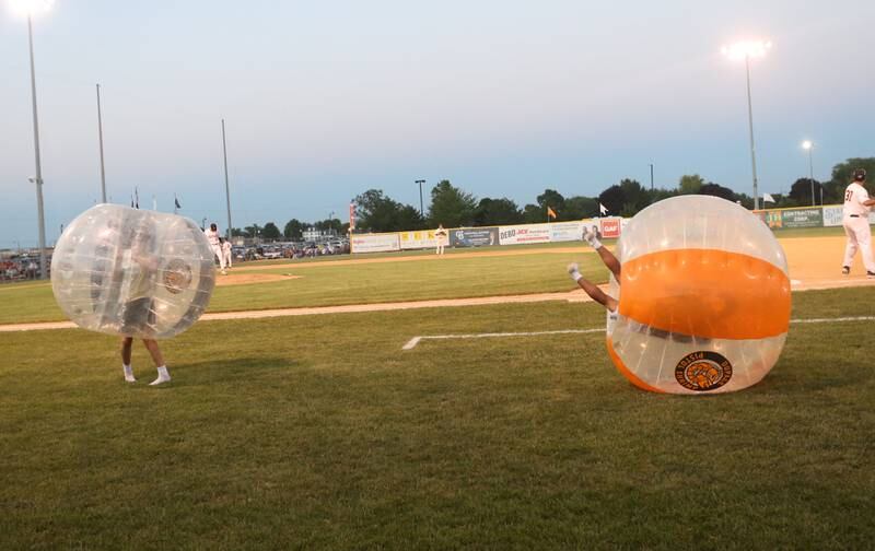 Kids play bumper balls between innings during the Prospect League Championship Series between the Illinois Valley Pistol Shrimp and Rex on Wednesday, Aug. 7, 2024 at Schweickert Stadium in Peru.