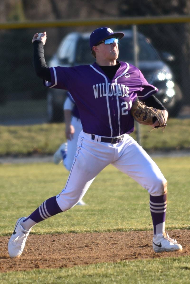Wilmington's Lucas Rink throws to first base during the Wildcats' road game at Bishop McNamara Monday, March 17, 2025.