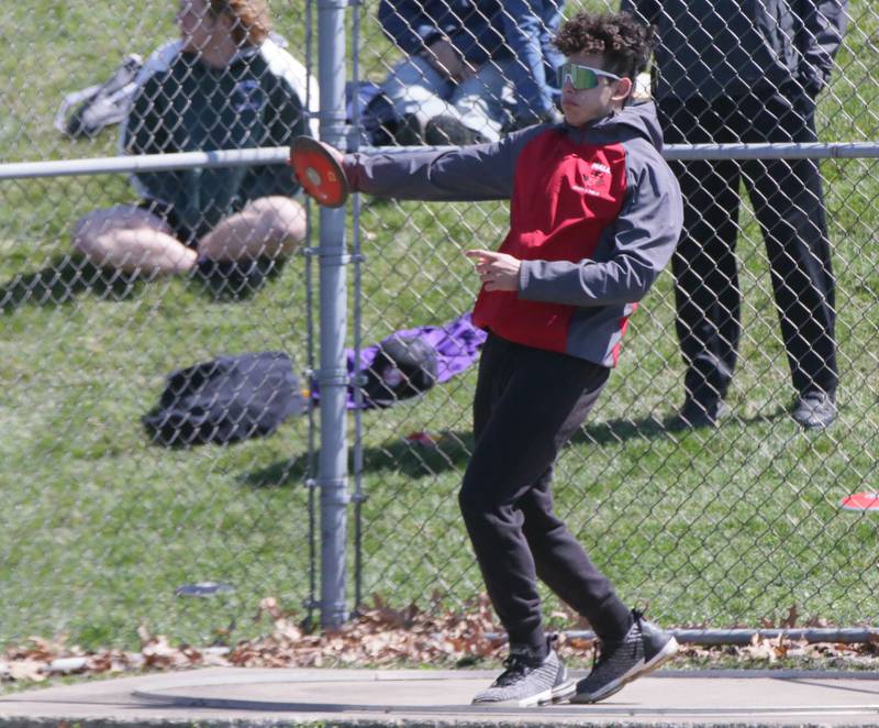 Hall's Rylan Kerper throws discus during the Rollie Morris Invite on Saturday, April 16, 2022 at Hall High School in Spring Valley.