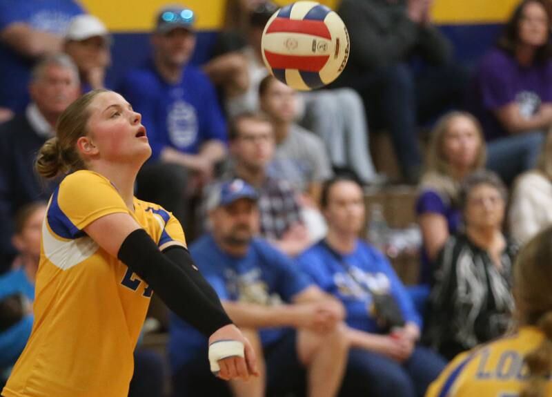 Logan's Kolbi Lawson returns a serve from Rockford-Marshall during the IESA Class 3A eighth-grade Regional final game on Thursday, March 13, 2025 at Logan Junior High School in Princeton.