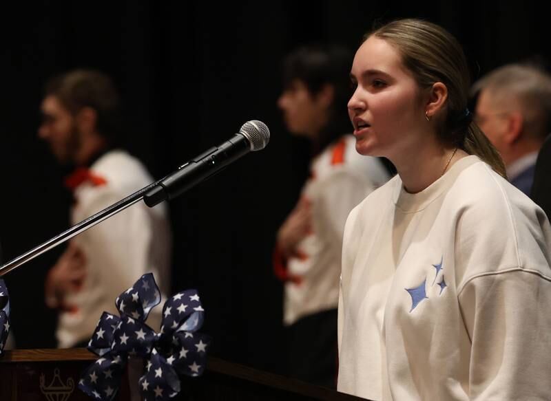Jayden Leone, a student at Hall High School, sings the National Anthem during the Veterans Day program on Tuesday, Nov. 11, 2025 in the Hall High School
