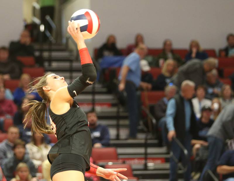 Timothy Christian's Bella Potempa sends a kill past Bloomington Central Catholic during the Class 2A State semifinal game on Friday, Nov. 15, 2024 at CEFCU Arena in Normal.