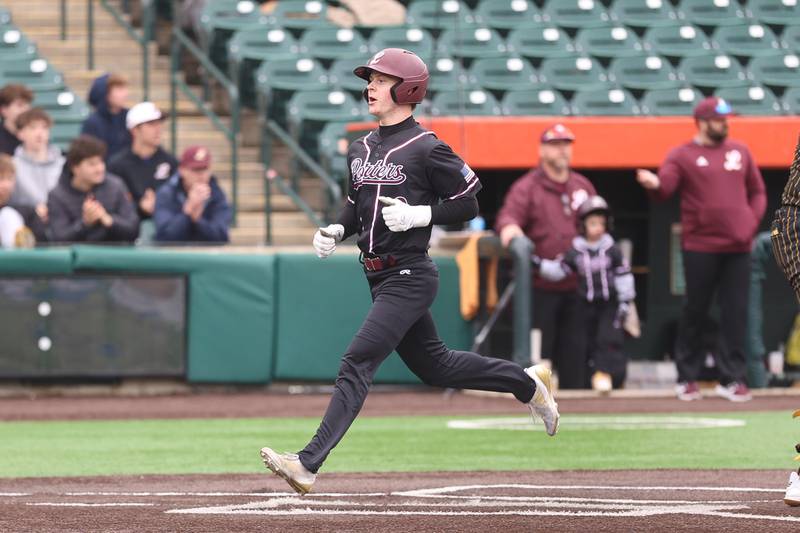 Lockport’s Zack Skrzypiec scores against Joliet West in the WJOL Don Ladas Memorial baseball tournament championship game on Saturday, April 4, 2026 in Joliet.