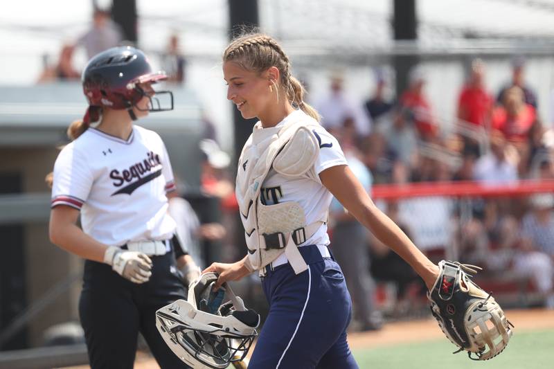 Lemont’s Frankie Rita smiles as she returns to behind the plate against Antioch in the Class 3A state championship game on Saturday, June 10, 2023 in Peoria.