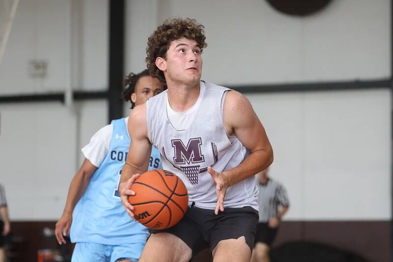 Morris’ Ximi Baftiri looks to take a shot against Plainfield South at the 37th Morris Boys Shootout on Tuesday, June 25, 2024.