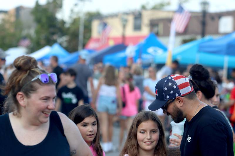 Crowds gather on Williams Street as part of National Night Out activities in downtown Crystal Lake on Thursday, Aug. 7, 2025.
