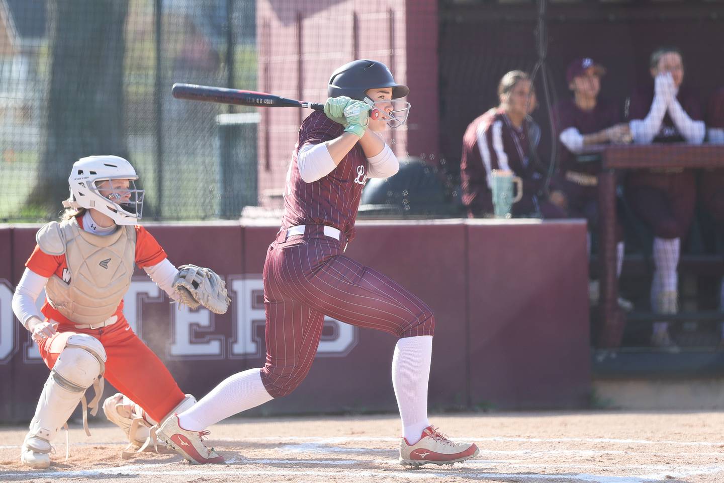 Lockport’s Alexis Vander Tuuk singles against Lincoln-Way West on Monday, April 20, 2026 in Lockport.