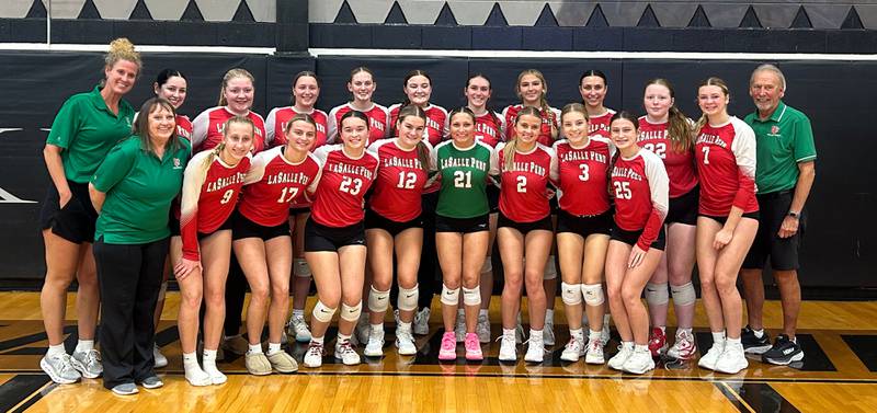 The La Salle-Peru volleyball team poses for a photo after beating Kaneland 25-19, 25-16 on Thursday, Oct. 23, 2025 in Maple Park to earn a share of the Interstate 8 Conference title.