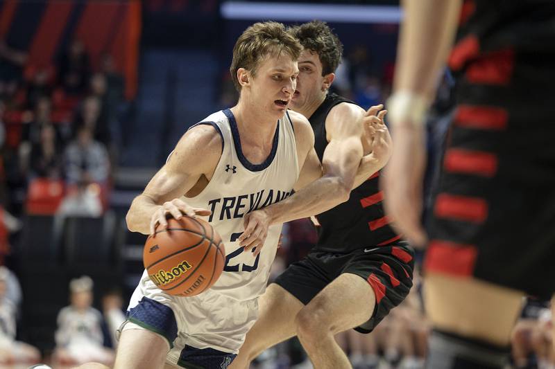 New Trier’s Jake Fiegen handles the ball against Benet Academy’s Sam DriscollFriday March 10, 2023 during the 4A IHSA Boys Basketball semifinals.