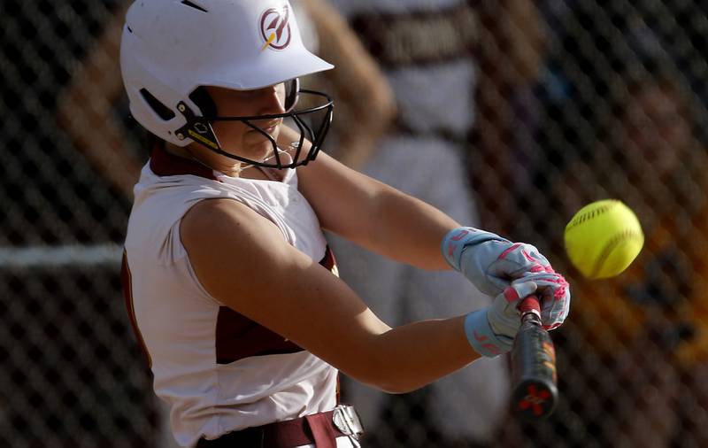 Richmond-Burton's Hailey Holtz connects with the ball during a Kishwaukee River Conference softball game against Marengo on Monday, May 12, 2025, at Richmond-Burton High School in Richmond.