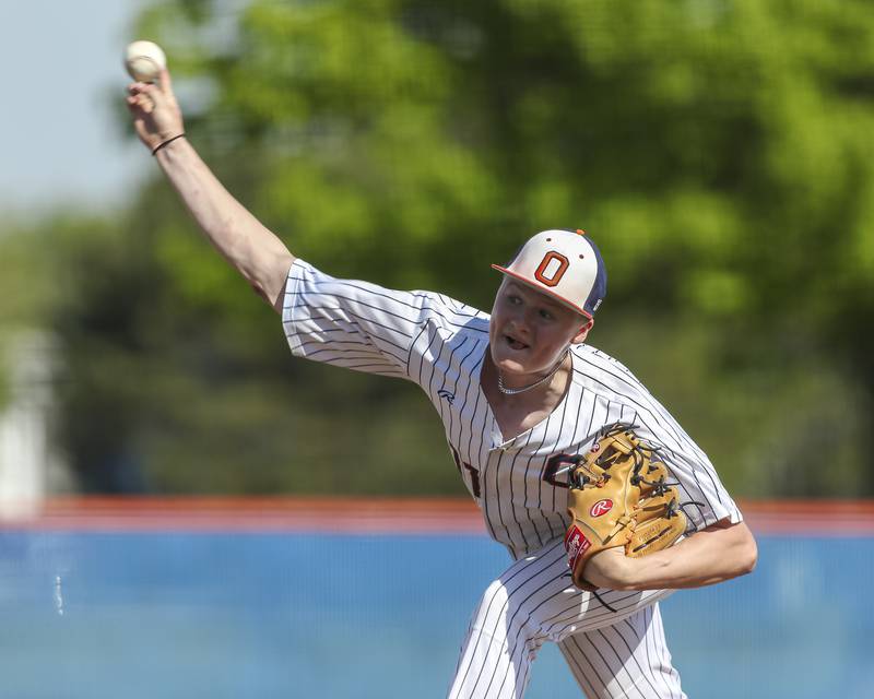 Oswego's Aaron AJ Knizner (11) delivers a pitch during baseball game Oswego East at Oswego.  May 14, 2026 in Oswego.