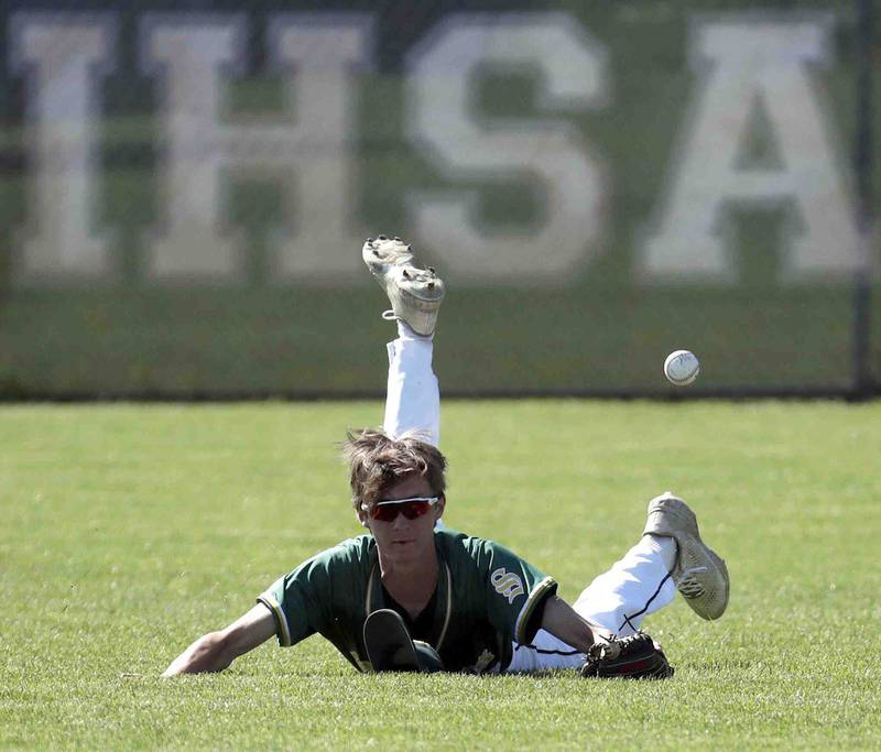 Crystal Lake South's James Carlson tries to make a diving catch during the IHSA Class 3A sectional semifinals, Thursday, June 2, 2022 in Grayslake.
