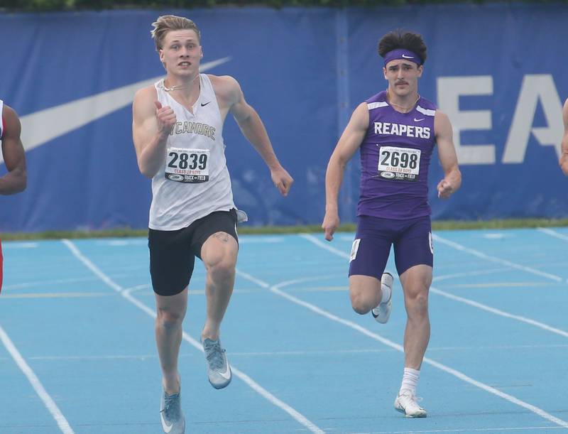 Sycamore's Aidan Wyzard and Plano's Tristan Meszaros compete  in the 200 meter dash during the IHSA Class 2A Boys Track & Field State Finals on Saturday, May 31, 2025 at Eastern Illinois University in Charleston.