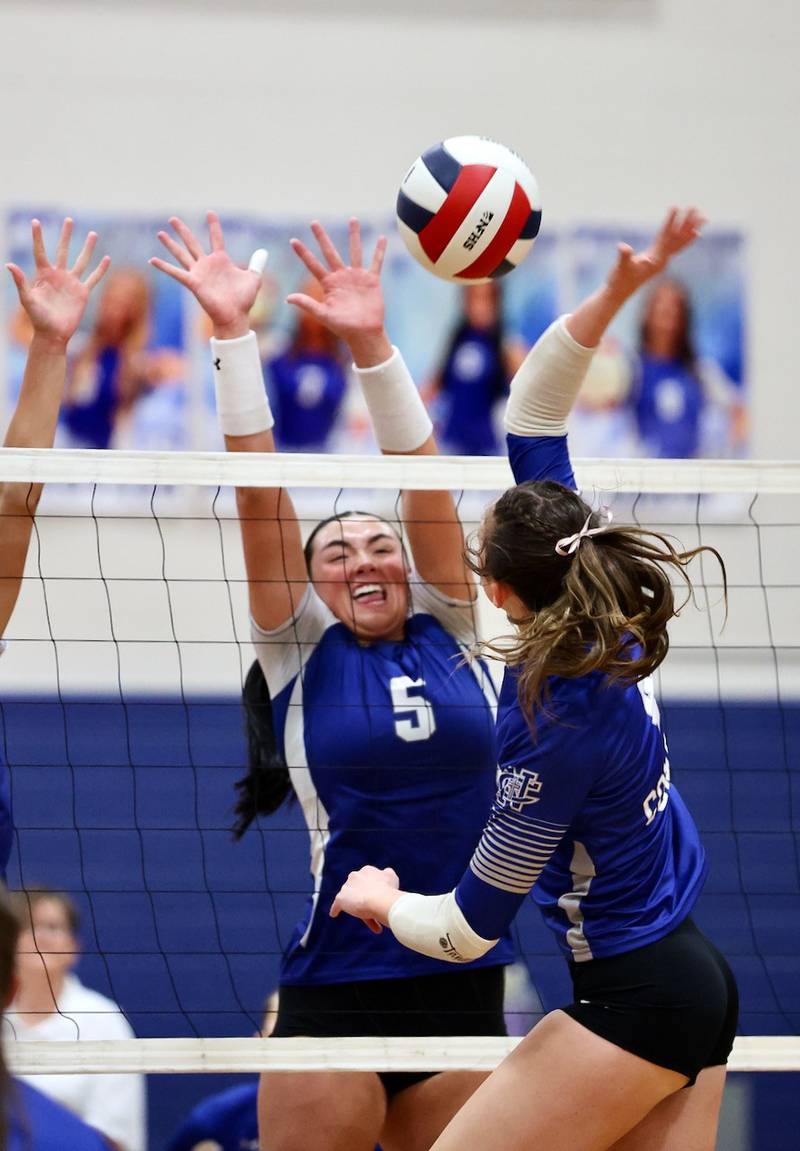 Princeton's Keely Lawson makes a block against Sterling Newman in Thursday's regional finals at Prouty Gym.