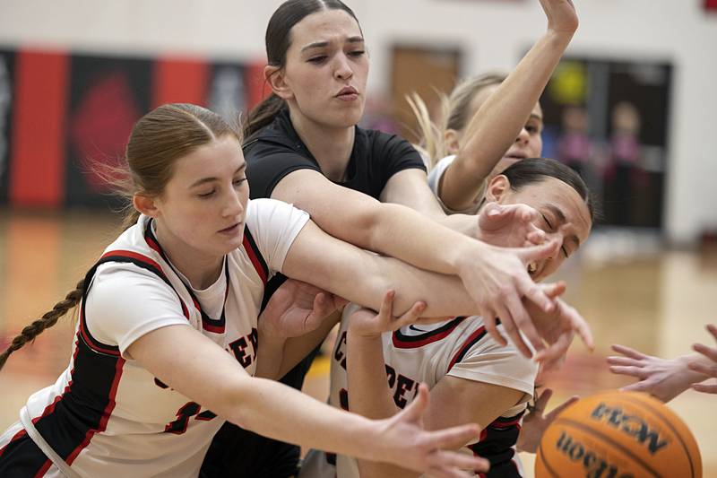 Amboy and AFC players scramble after a ball Tuesday, Jan. 27, 2026.
