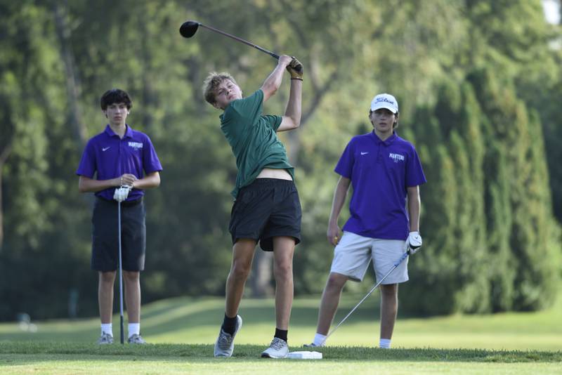 Grant Park's Isaiah Salin tees off at Minne Monesse Golf Club as Manteno's Liam Jedlicka, left, and Robert Wilhelm, right, watch on Friday, August 15, 2025.