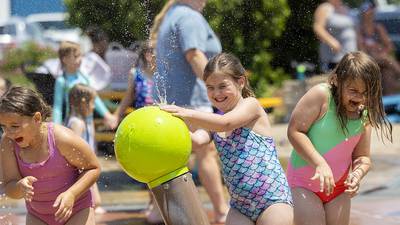 Photos: Dixon's splash pad draws crowd looking for heat relief