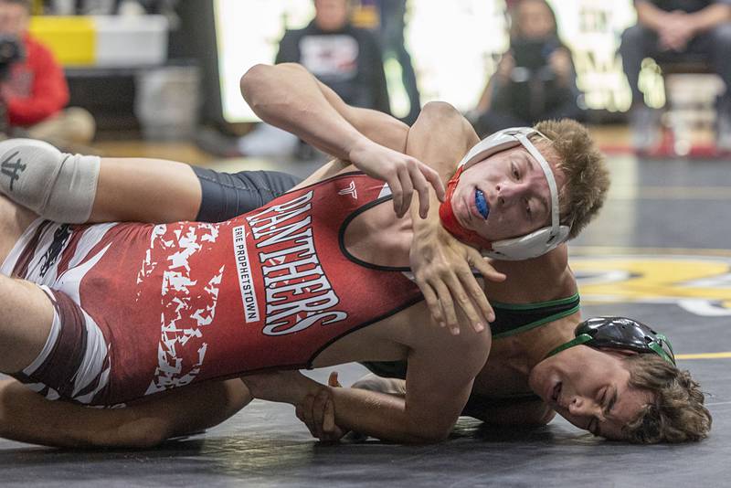 Rock Falls’ Josiah Tarbill takes down Erie’s Noah Wetzell 144 pound finals Saturday, Jan. 31, 2026, during the Class 1A Wrestling Regionals at Riverdale High School. Tarbill won 14-3.
