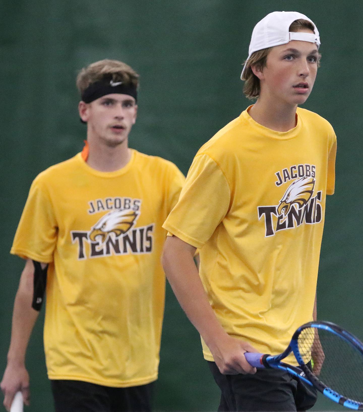 Jacobs' John Kaiser, left, and Justin Cunningham take on Huntley's Thomas Patel and Andrew Burkey in the Fox Valley Conference boys tennis tournament doubles finals at The Racket Club on Friday, May 28, 2021 in Crystal Lake.