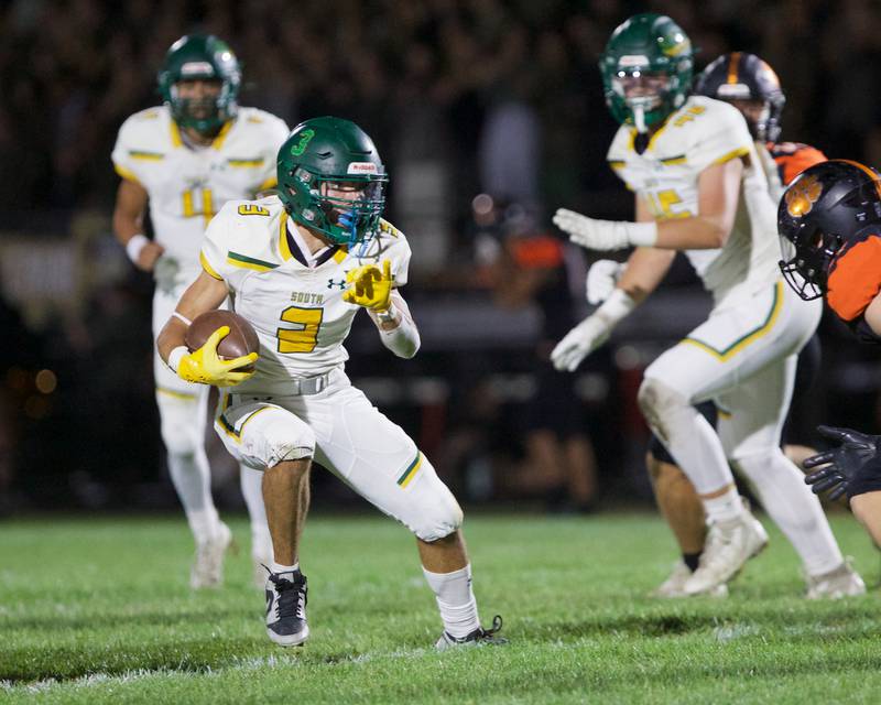 Crystal Lake South's Logan Miller looks to run the ball against Crystal Lake Central on Friday, Sept. 27,2024 in Crystal Lake.