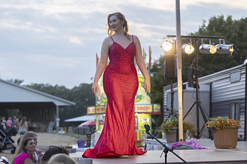 Maggie Eden takes the stage for the evening gown competition Wednesday August 2, 2023 during the Miss Ogle County pageant.