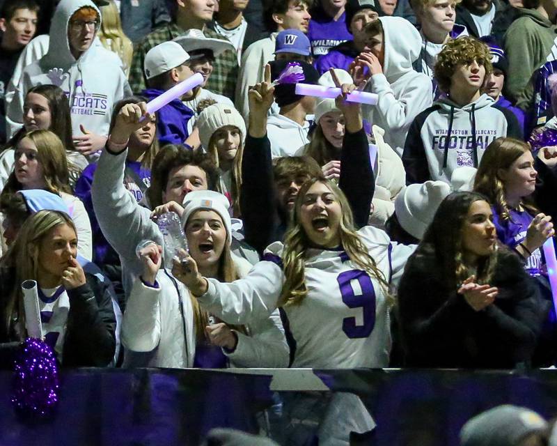 The Wilmington student section cheers on the team during Class 2A semi-final playoff football game between Moroa-Forsyth at Wimington.  Nov 18, 2023.