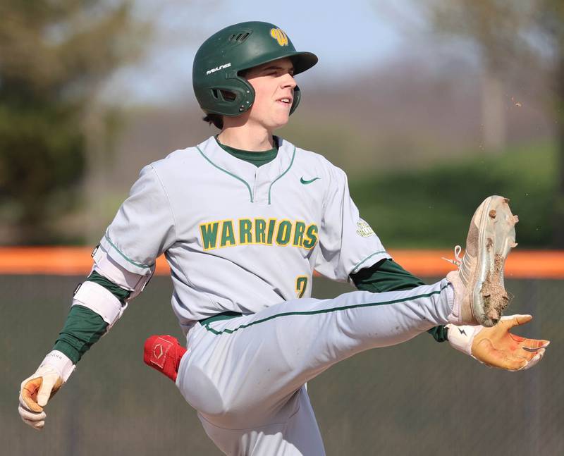 Waubonsie Valley's Parker Howland celebrates after hitting a double Monday, April 20, 2026, during their game at DeKalb High School.