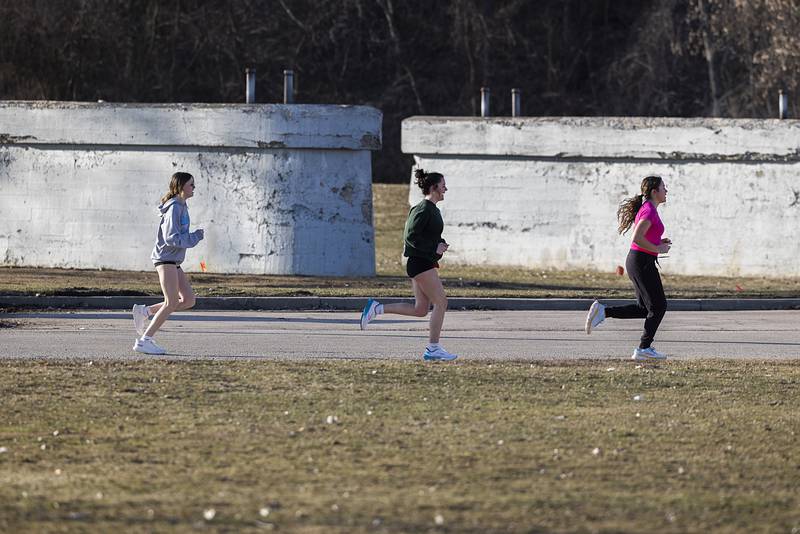 Members of the Dixon track team take their training outside Monday, Feb. 12, 2024 as they look forward to the upcoming season. Near fifty degree weather brought people outside for fun and activities.