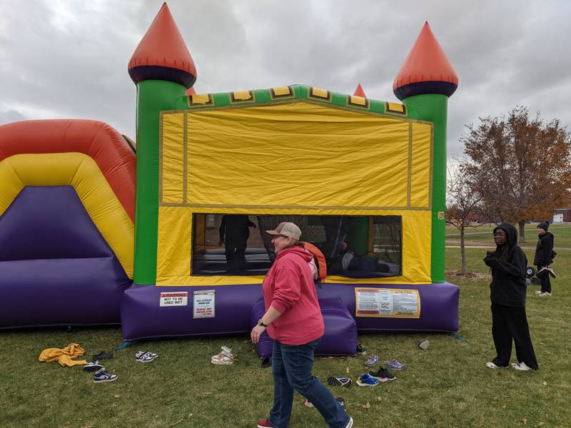 The Oswego Junior Women's Club on Nov. 8 hosted a pumpkin smash community composting event at Prairie Point Community Park in Oswego. Kids also had the opportunity to play in a bouncy house at the event.