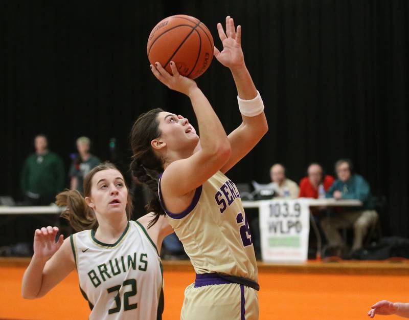 Serena's Paisley Twait eyes the hoop over St. Bede's Quinn McClain during the Class 1A Sectional final game on Thursday, Feb. 22, 2024 at Gardner-South Wilmington High School.