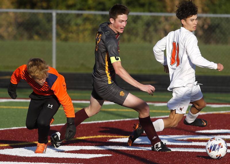 Richmond-Burton's Sean Rockwell watches his gall room into the goal for the first score of the game during the IHSA Class 1A Richmond-Burton Regional Final soccer match against Winnebago Tuesday, Oct. 17, 2023, at Richmond-Burton High School in Richmond.