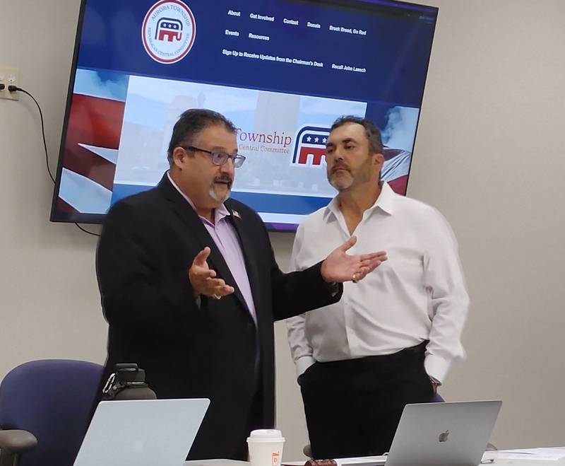 Aurora Township GOP Chairman Danny Souri (left) and Kane County GOP Chairman Andro Lerario discuss challenges to the local Republican Party at a meeting Wednesday, Oct. 1 in St. Charles.