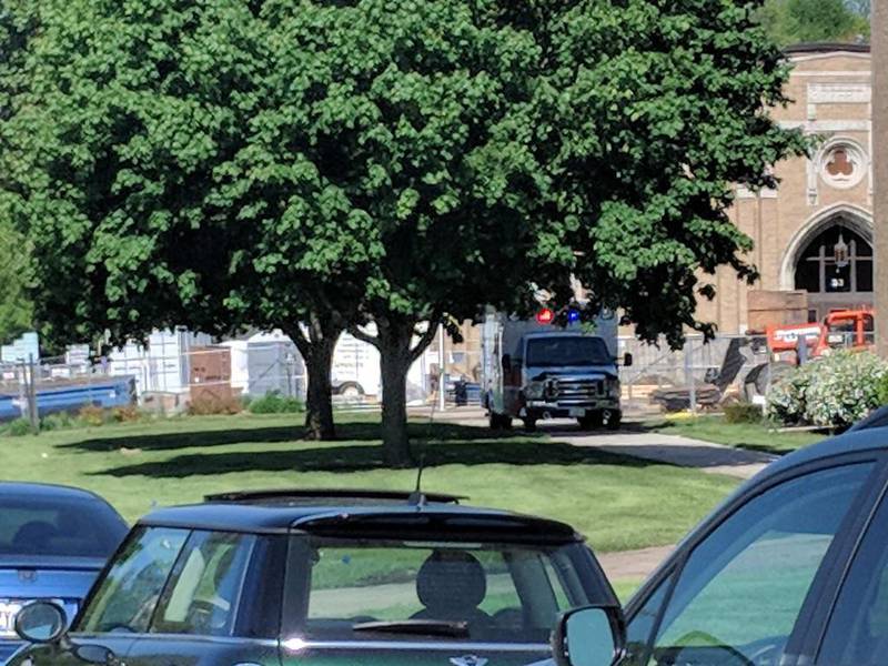 A 19-year-old former Dixon High student is in custody with a non-life-threatening gunshot wound after bringing a gun to the school this morning.