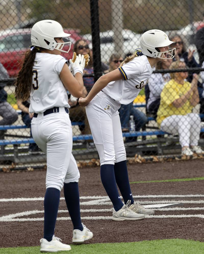 Sterling’s Marley Sechrest celebrates a two-run double by teammate Sterling’s Lily Martinez against Moline Tuesday, April 22, 2025.