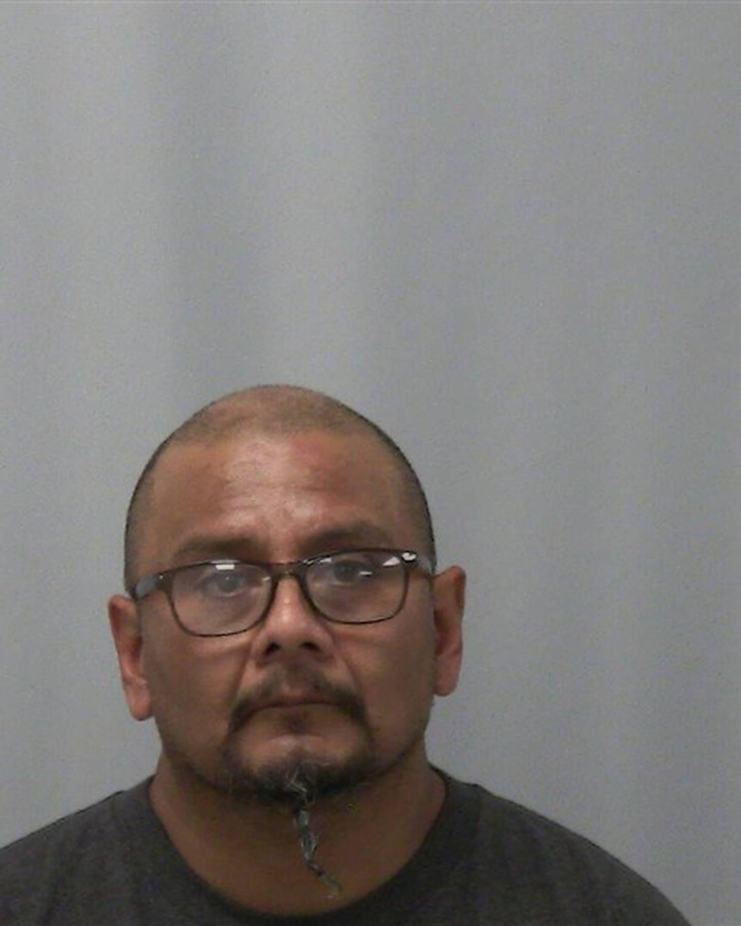 Ruben Perez, 48, of Dothan, Alabama, is charged in Lee County with two counts of unlawful possession of a weapon/body armor by a felon, a Class X felony; unlawful possession of an explosive device, a Class 1 felony; and unlawful possession of a weapon by a felon, a Class 3 felony; and two misdemeanors, unlawful possession of an assault weapon and unlawful possession of drug paraphernalia.