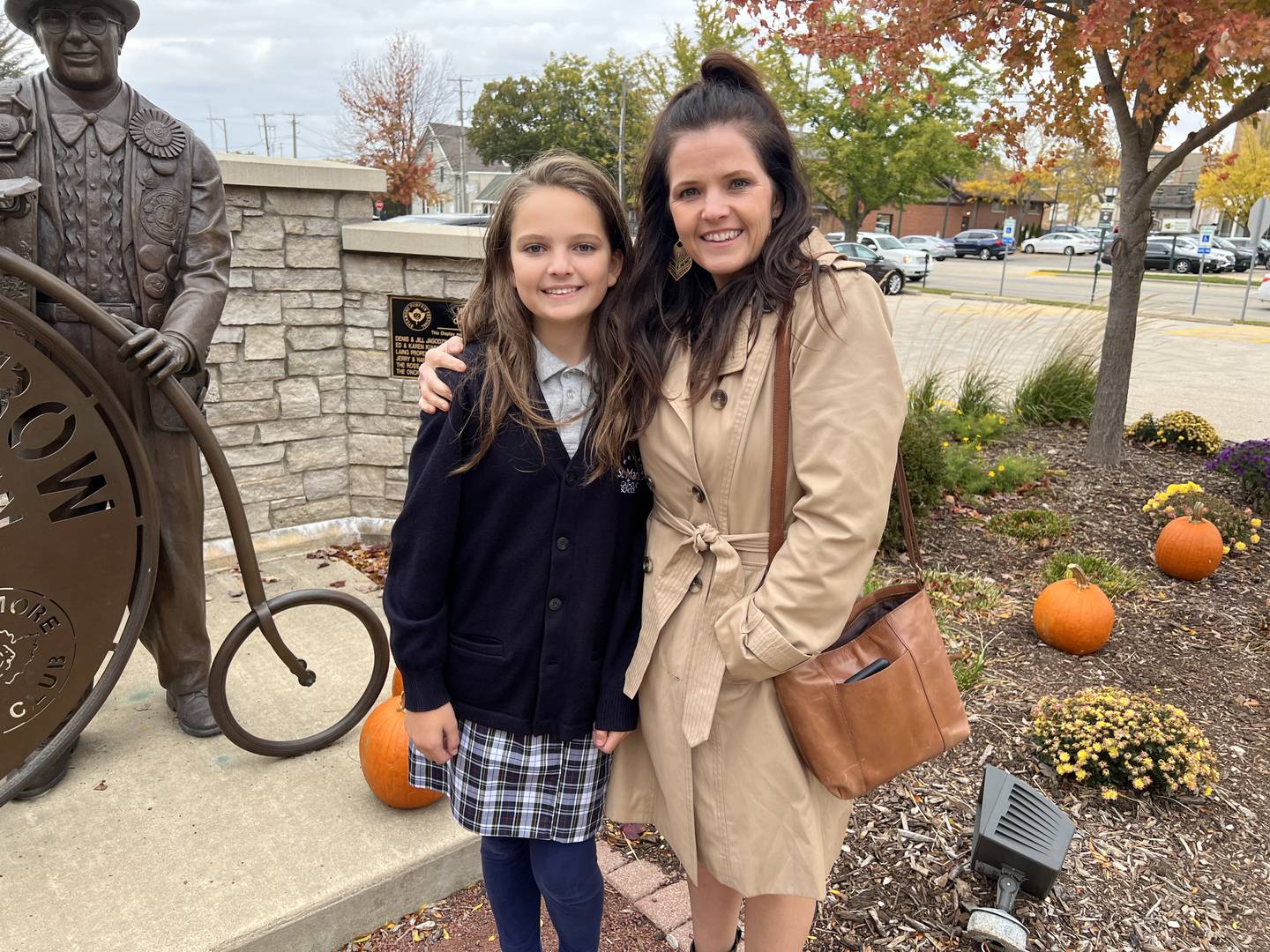 Vivian Rubicz and her mother, Katie Rubicz stand at the corner of West Elm Street and Somonauk Street on Oct. 13 2022.