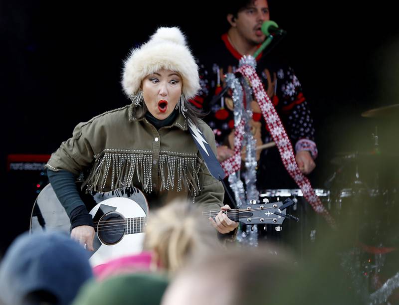 KT Tunstall sings a song during a stop in Pingree Grove on Wednesday Nov. 27, 2024, by the Canadian Pacific Kansas City Railway 2024 Holiday Train. The holiday train raised food and monetary donations for the D300 Food Pantry during its stop in Pingree Grove.