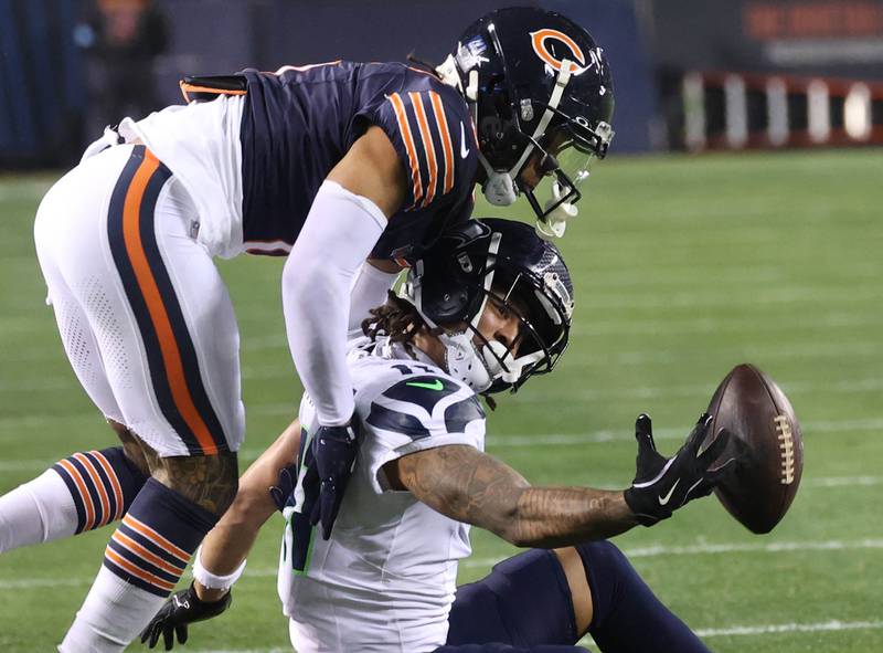 Chicago Bears cornerback Kyler Gordon breaks up a pass intended for Seattle Seahawks wide receiver Jaxon Smith-Njigba during their game Sunday, Dec. 26, 2024, at Soldier Field in Chicago.