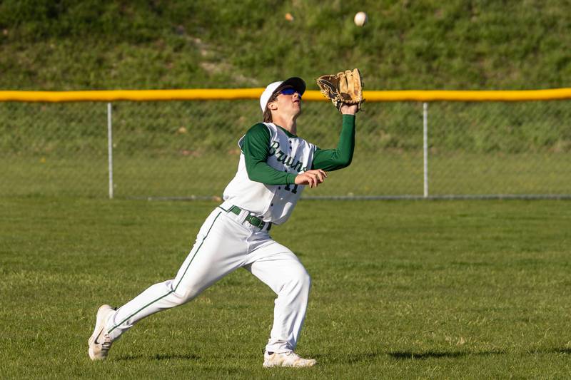 AJ Hermes (11) of St. Bede catches fly ball in left field on Tuesday, April 15, 2025 at St. Bede Academy in Peru.