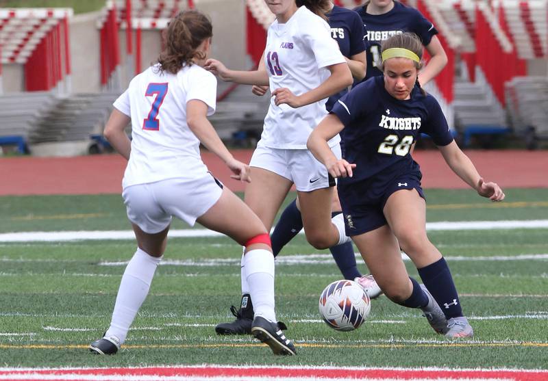 IC Catholic Prep's Lillianna Costa works to get around Pleasant Plains' Adi Fraase during the IHSA Class 1A state girls soccer third place game Saturday, May 27, 2023, at North Central College in Naperville.