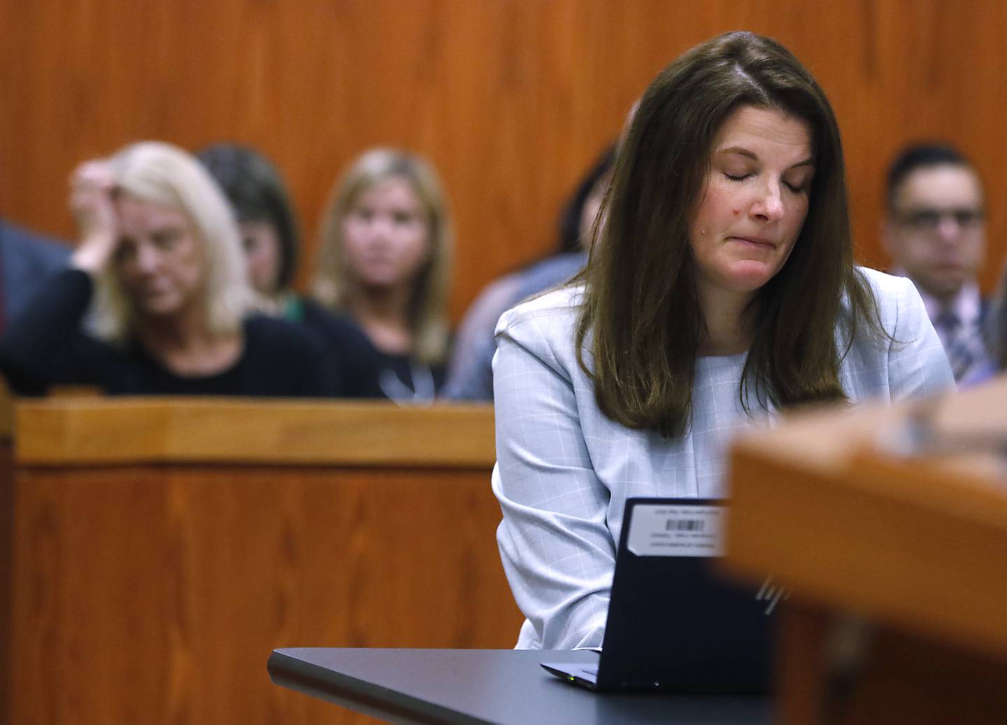 McHenry County State's Assistant Attorney  Randi Freese tries to contain her emotions as victim gives her statement during Carlos Acosta’ sentencing hearing before Lake County Judge George Strickland on Thursday, June 6, 2024. Acosta, a former Illinois Department of Children and Family Services employee, who was found criminally guilty for mishandling the case of AJ Freund before the Crystal Lake boy was killed by his mother, as sentenced to six months in jail and 30 months of probation.