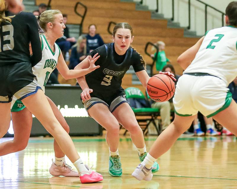 Oswego East's Maggie Lewandowski (3) handles the ball in their York Thanksgiving Tournament game between Oswego East at York on Monday, Nov 18, 2024  in Elmurst.