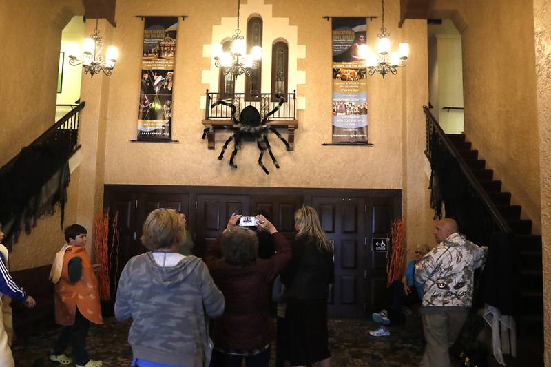 People look at the lobby before a showing of “Hocus Pocus” at the Northwest Herald, Shaw Local News Network Subscriber Appreciation event Sunday, Oct. 15, 2023, at the Raue Center For the Arts in Crystal Lake.