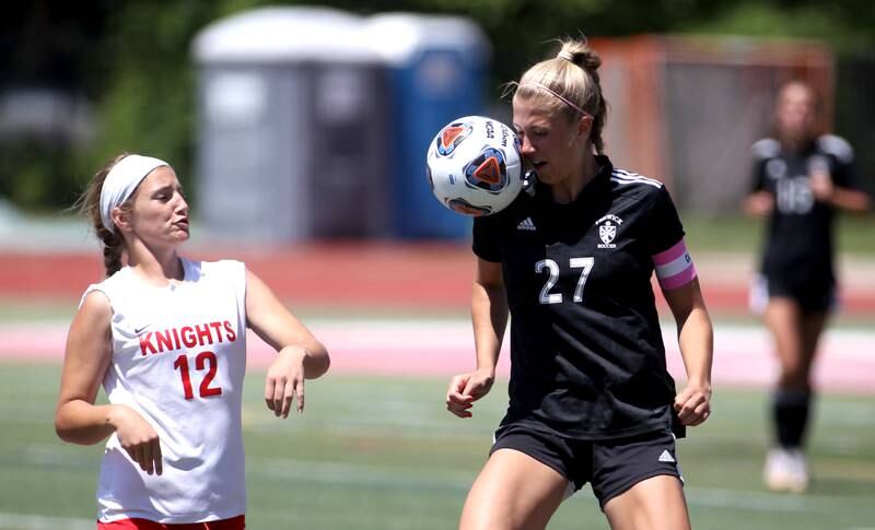 Fenwick’s Kate Henige (27) gets control of the ball during an IHSA Class 2A state semifinal game against Triad at North Central College in Naperville on Friday, June 3, 2022.
