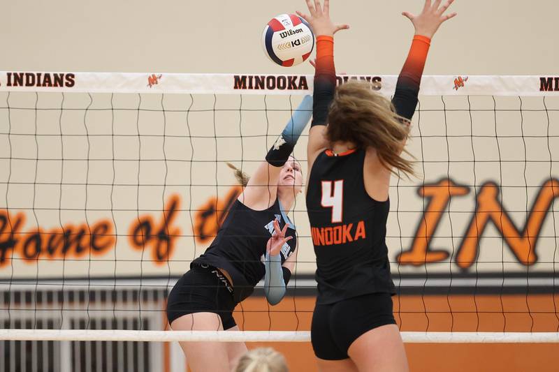 Joliet Catholic’s Brooke Simon hits a shot against Minooka on Wednesday, Sept. 4, 2024 in Minooka.