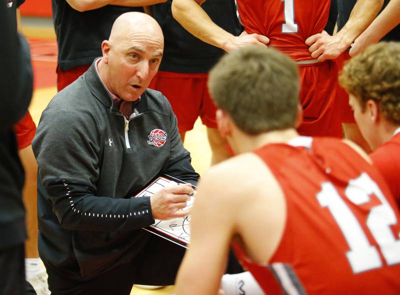 Hinsdale Central coach Nick Latorre talks to the team during a timeout at the Hinsdale Central Holiday Classic championship game between Oswego East and Hinsdale Central high schools on Thursday, Dec. 29, 2022 in Hinsdale, IL.