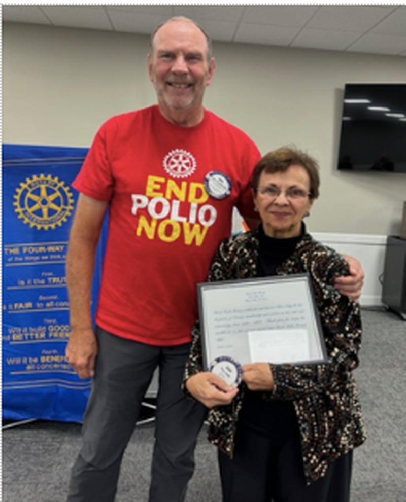 Bob Sondgeroth, Past Immediate President of Rock Falls Rotary, presented  a club Rotary badge and a certificate to Pam Erby, honoring her as a trailblazer for women in Rock Falls Rotary.