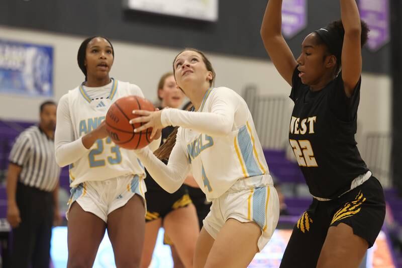 Joliet Catholic’s Camryn Kinsella looks to take a shot against Joliet West in the 2023 WJOL Girls Basketball Tournament on Friday, Nov. 17, 2023, in Joliet